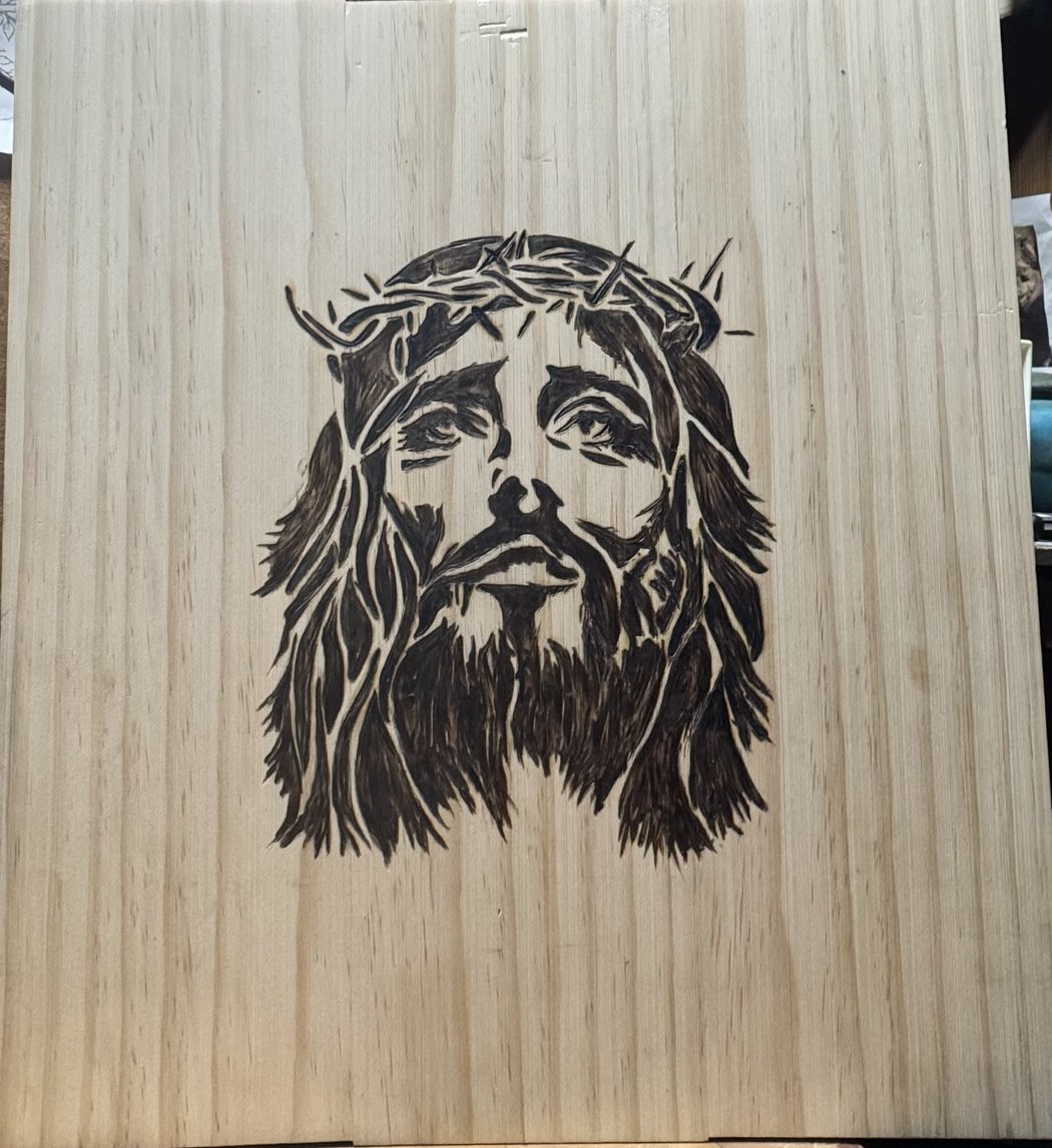 Amen — finished woodburning of Jesus with a crown of thorns on a pine board