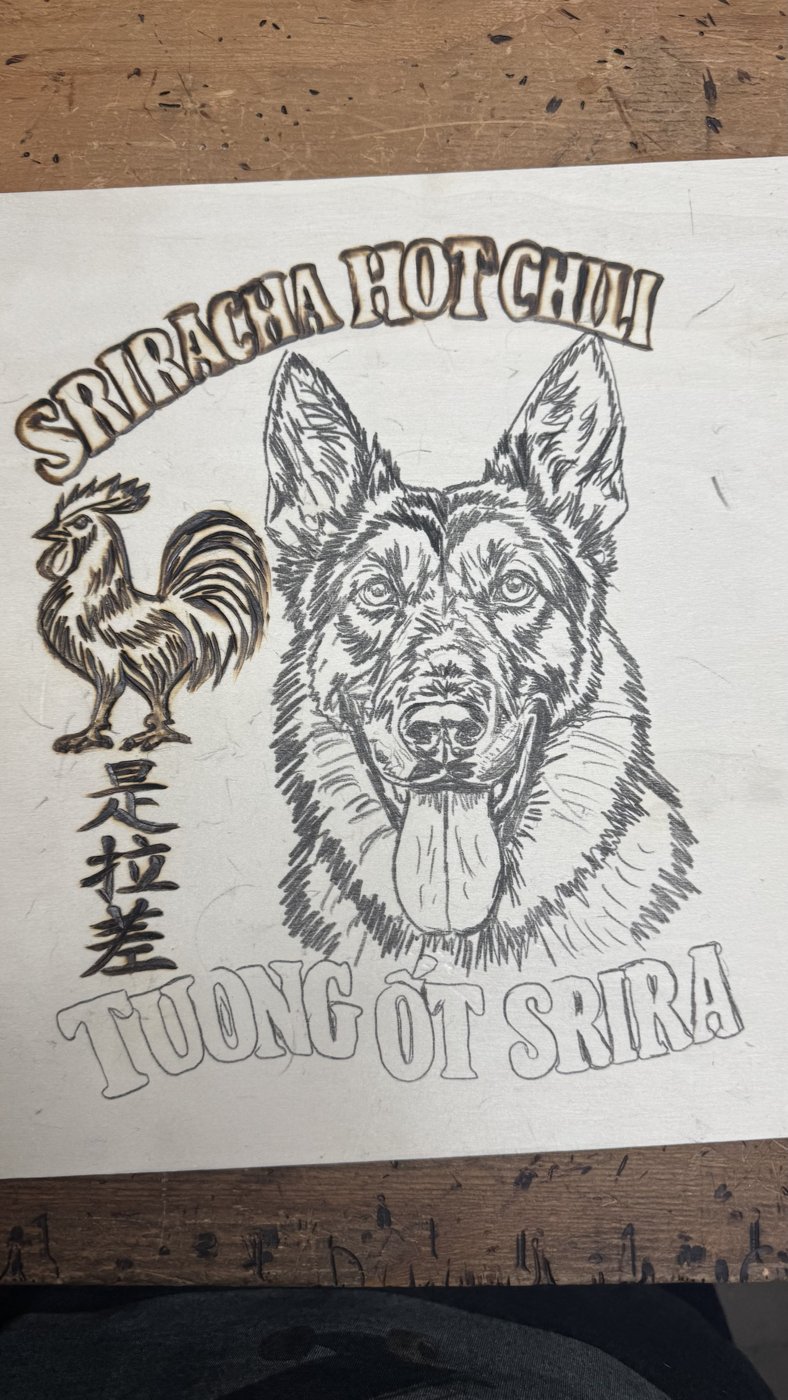 The dog piece with the rooster, characters and top lettering burned in, German Shepherd still in pencil