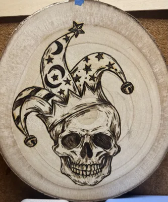 The Joker, newly finished woodburning of a jester skull