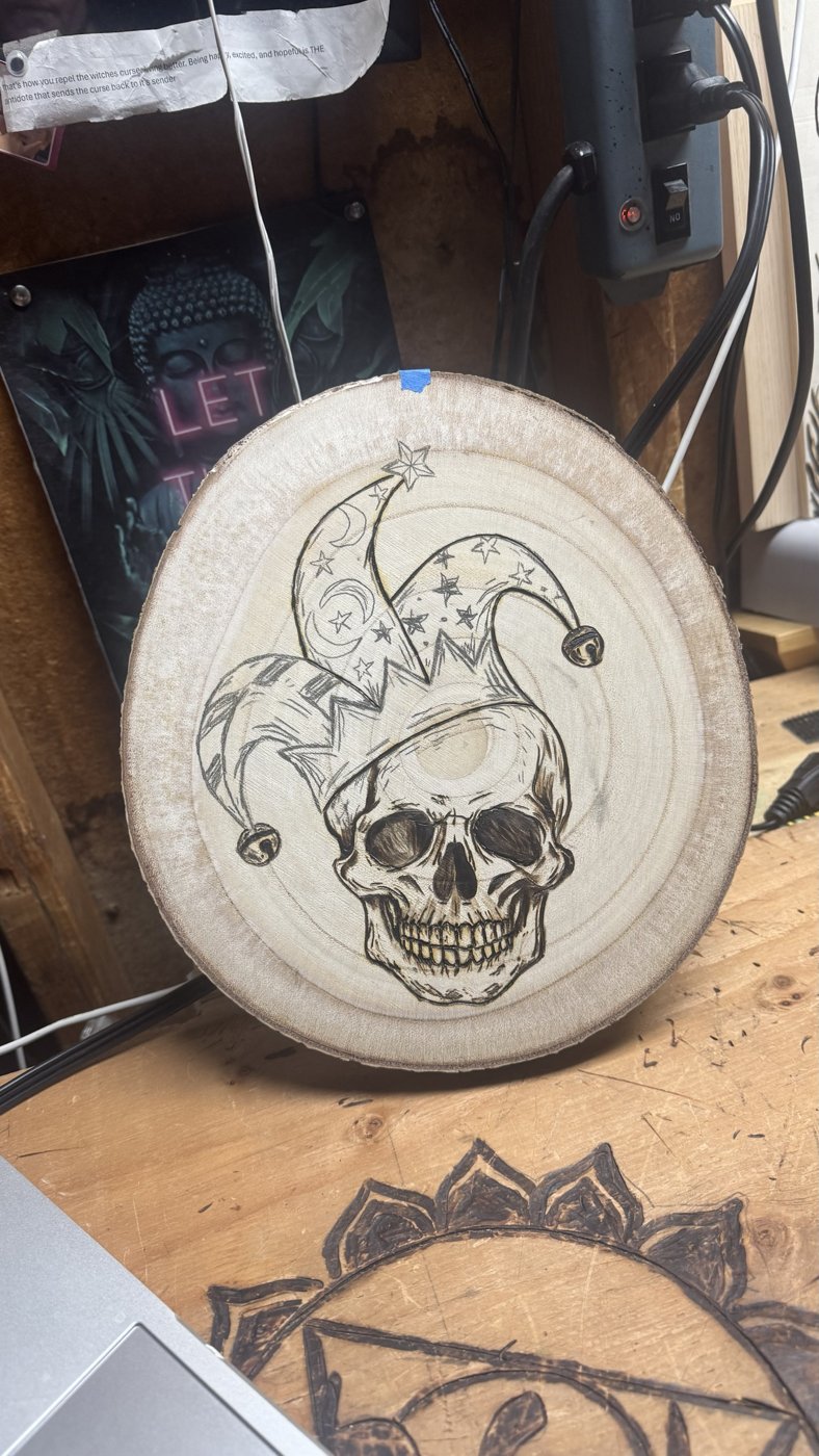 The same jester skull piece with shading started on the skull
